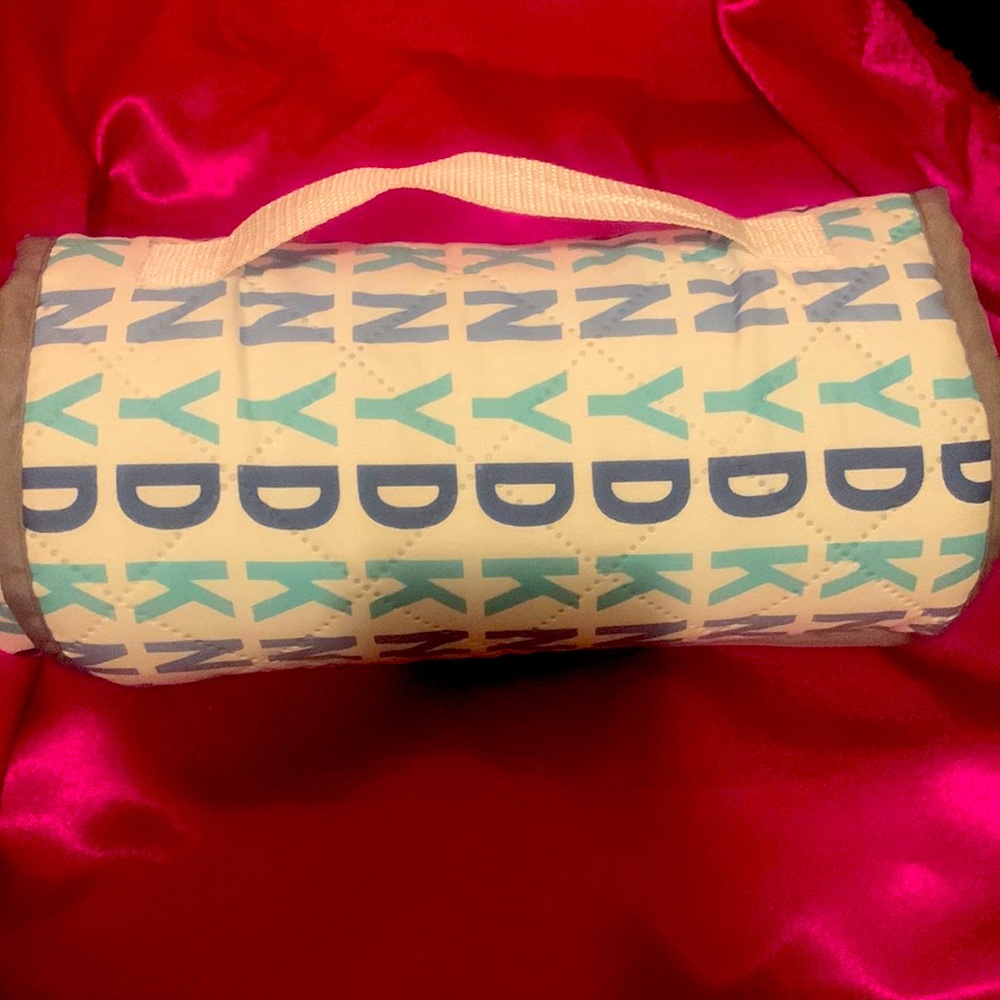 DKNY baby mat, new and never used or even unrolled . Long!!